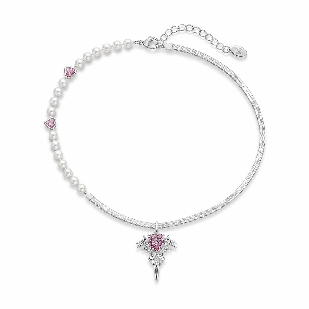 BAD ANGEL Pearl Halo Necklace laid flat: a graduated pearl half-strand with two pink heart-cut stones, a flat snake chain half, and a winged pendant