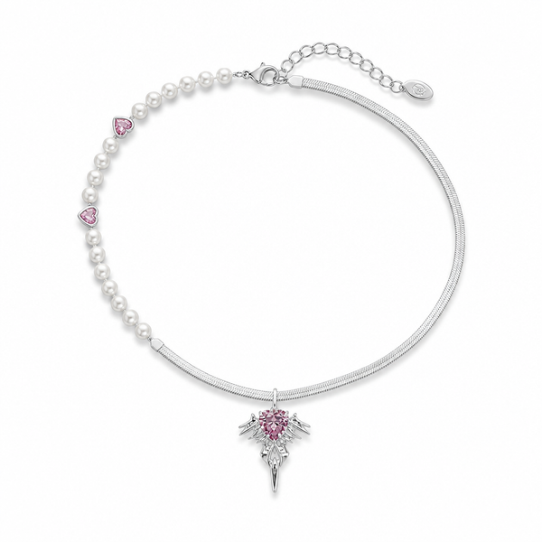 BAD ANGEL Simulated Pearl Halo Necklace laid flat: a graduated simulated-pearl half-strand with two pink heart-cut stones, a flat snake chain half, and a winged pendant