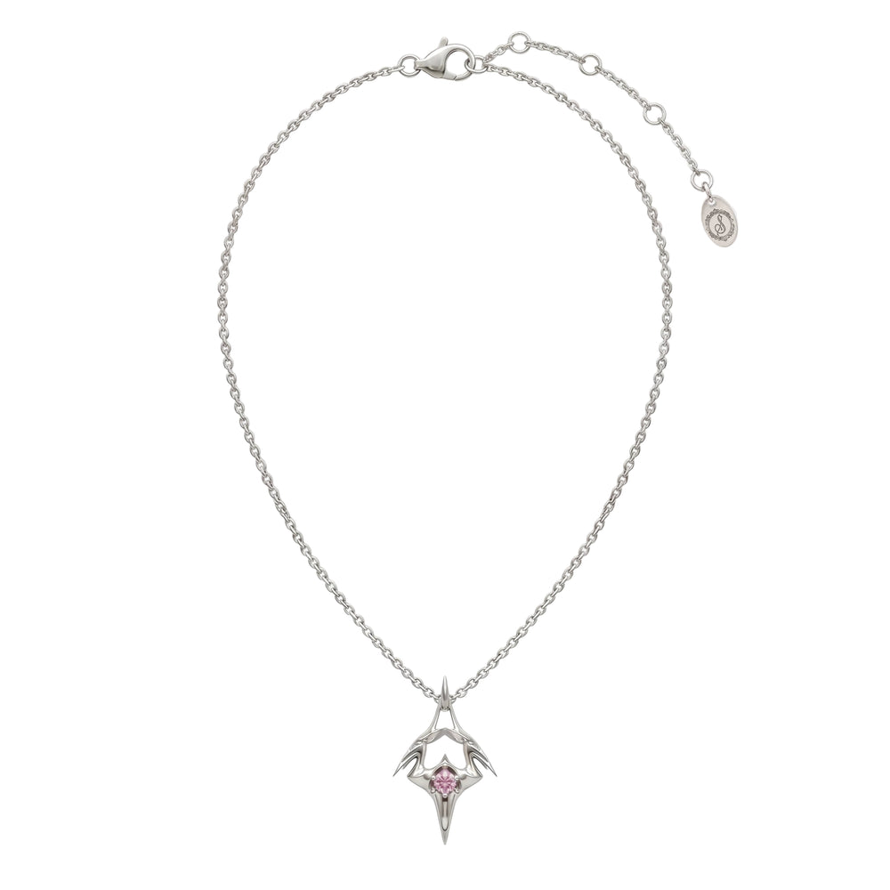 Silver necklace with a star-shaped pendant featuring a pink gemstone on a white background