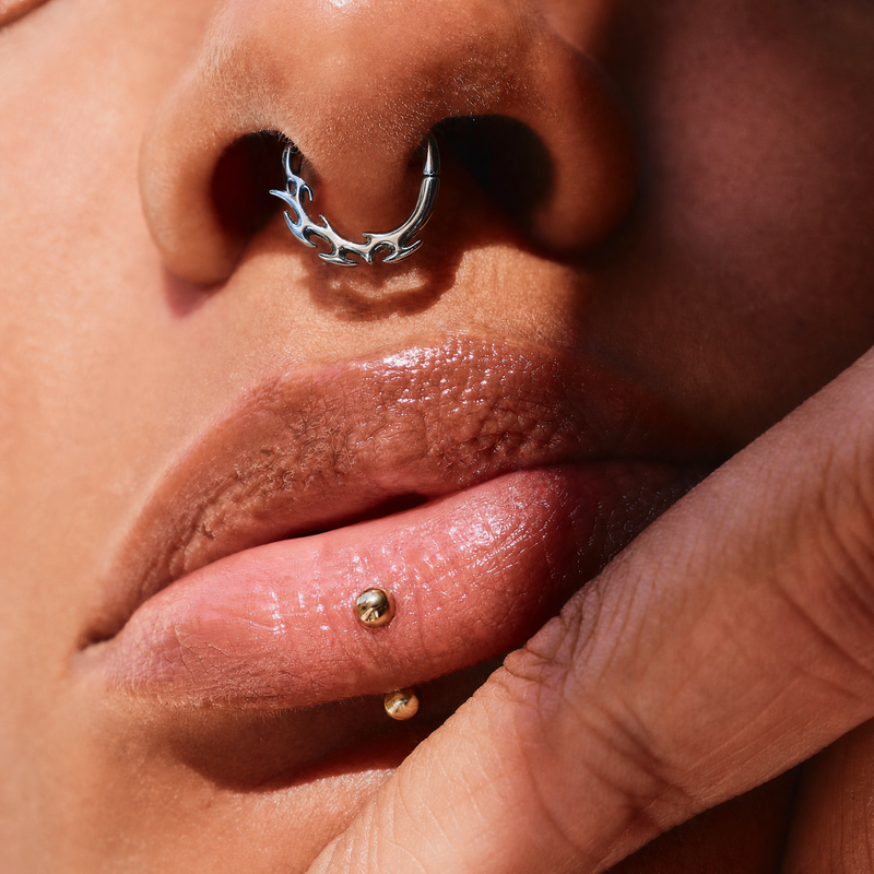 Thorn Flame Clicker — Titanium Nose Ring, 16G 8 mm worn