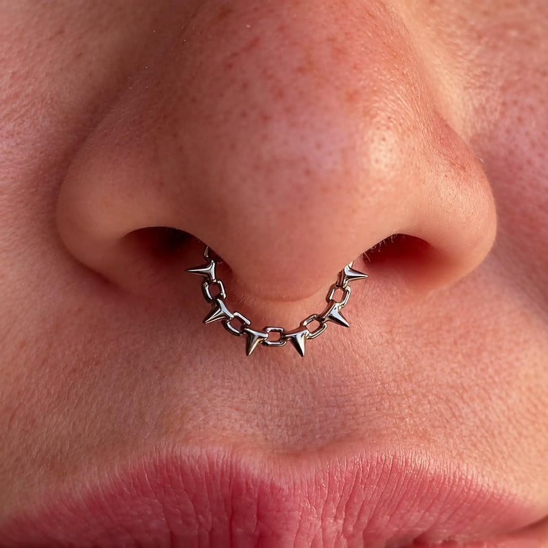 Thorn Flame Clicker — Titanium Nose Ring, 16G 8 mm worn